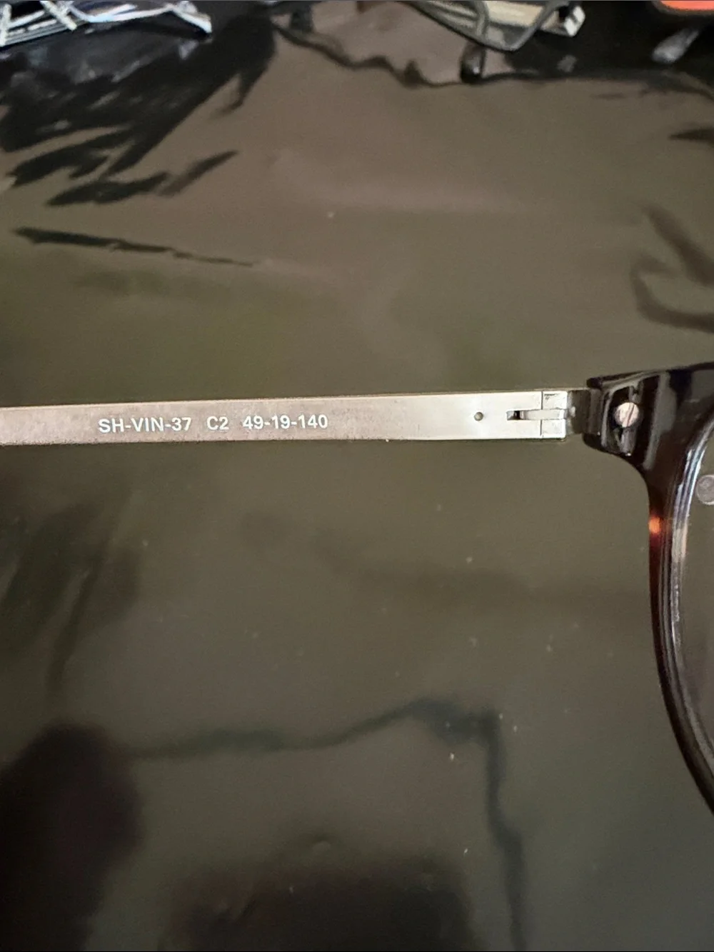 Black Round with Brushed Silver Glasses